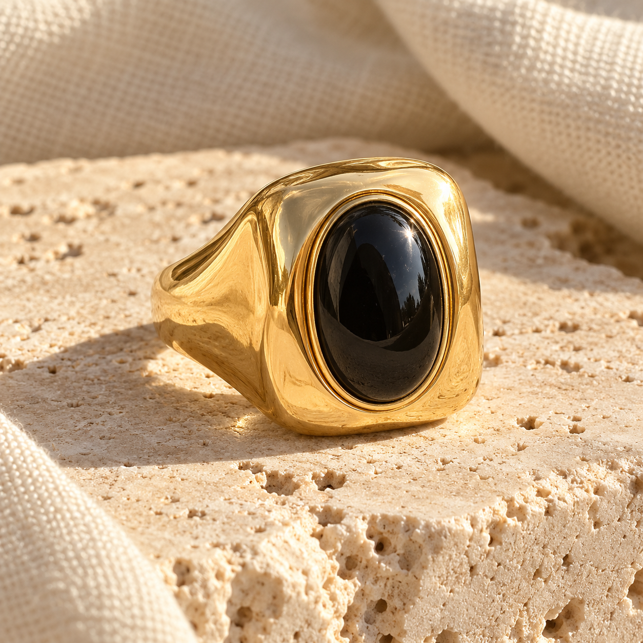 Ardhi gold signet ring with polished oval black onyx