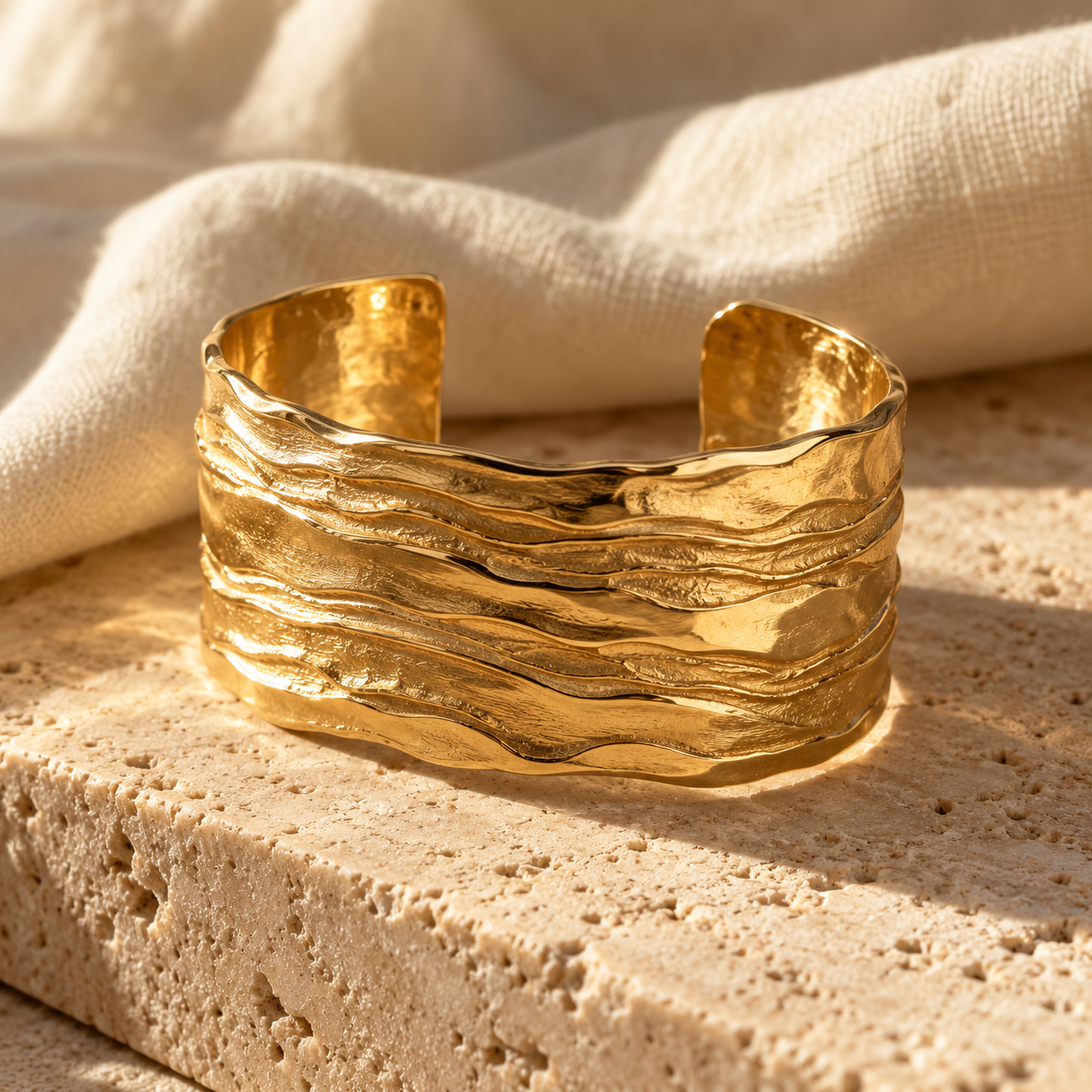 Wide carved-gold Imara cuff with layered geological texture
